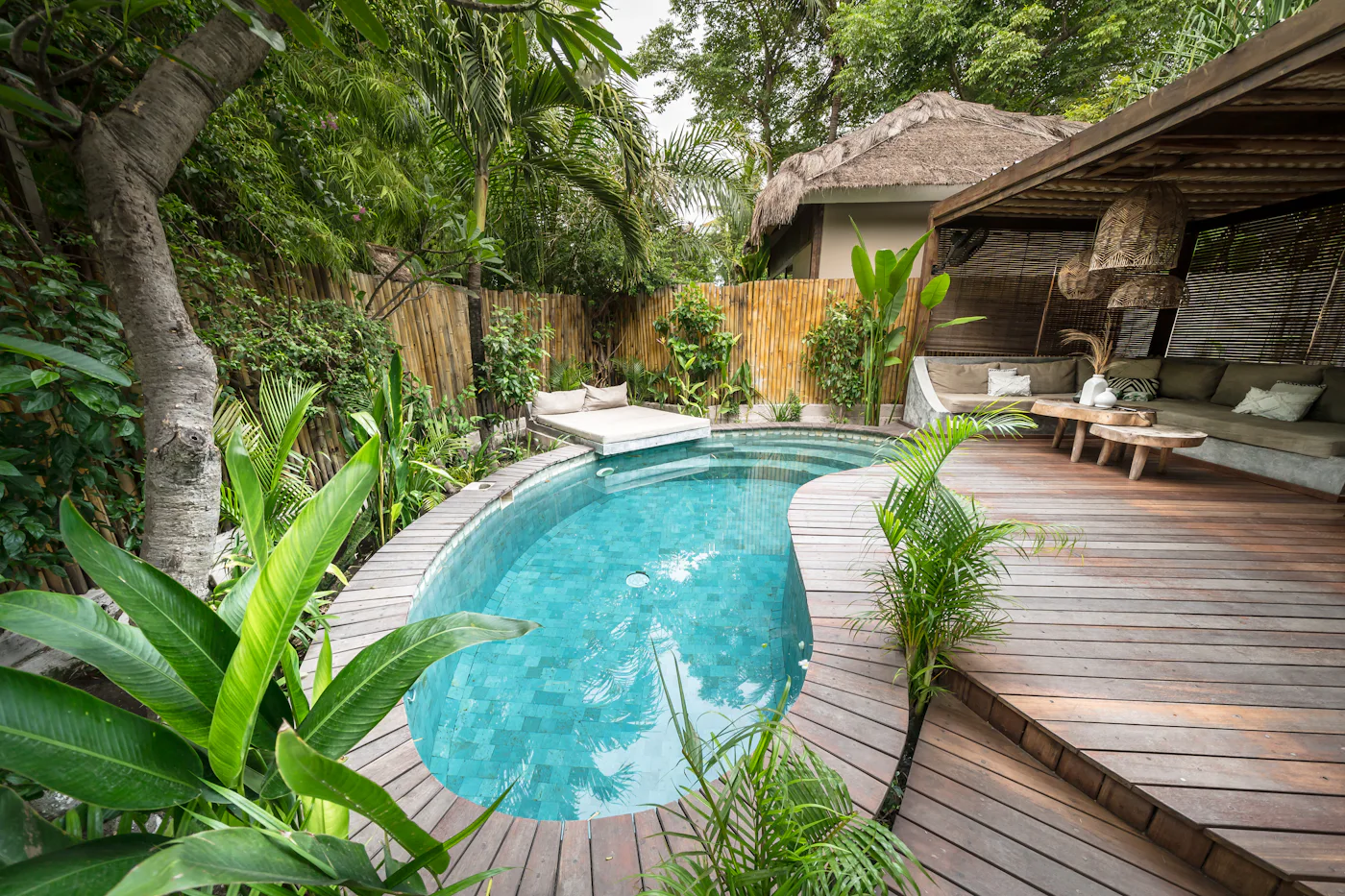 Cottage with a private plunge pool and wooden deck at MJR Farms Resort